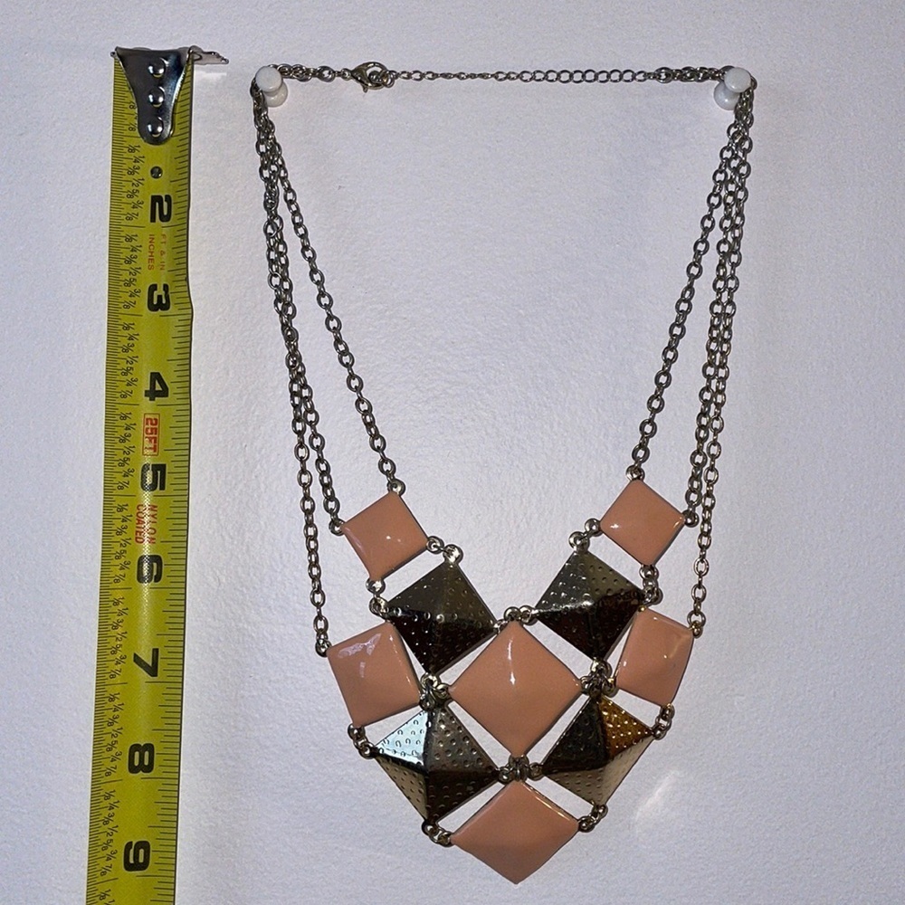 Women’s fashion necklace in peach and gold colors